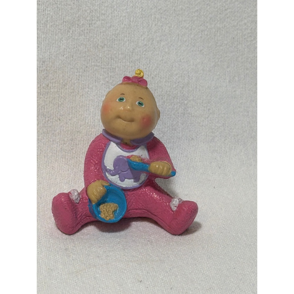 Vintage Cabbage Patch Kids PVC Figurine Baby Girl in Pink Sleeper Eating 2 Inch